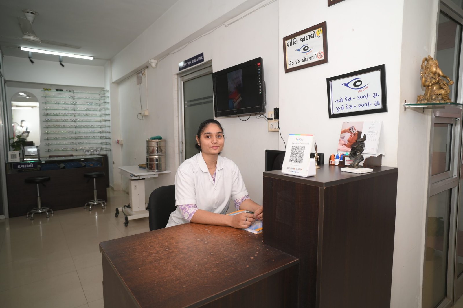 Reception staff at Vidya Eye Hospital front desk
